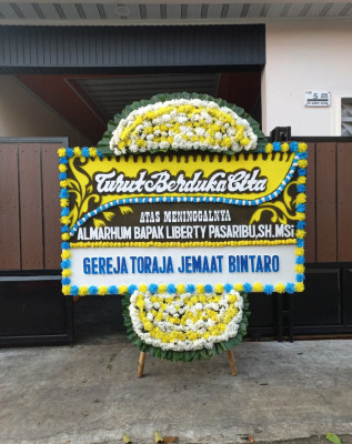 Papan Bunga Duka di Nunggawi